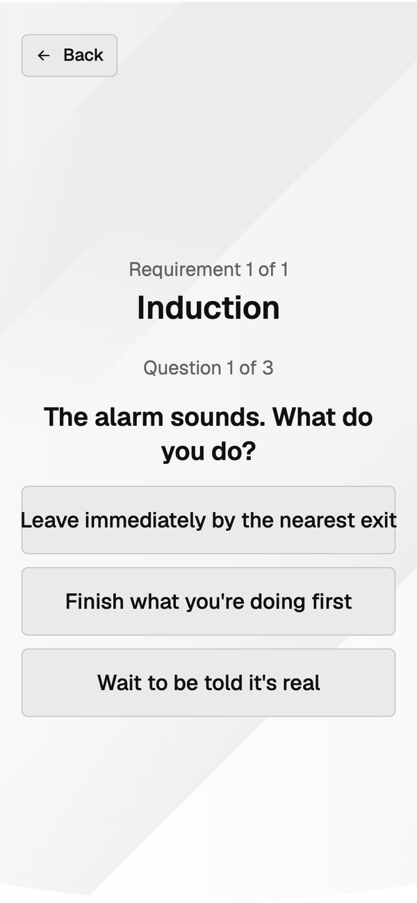 A real induction question at sign-in — the alarm sounds, what do you do? — marked by the server, with a pass required to sign in.