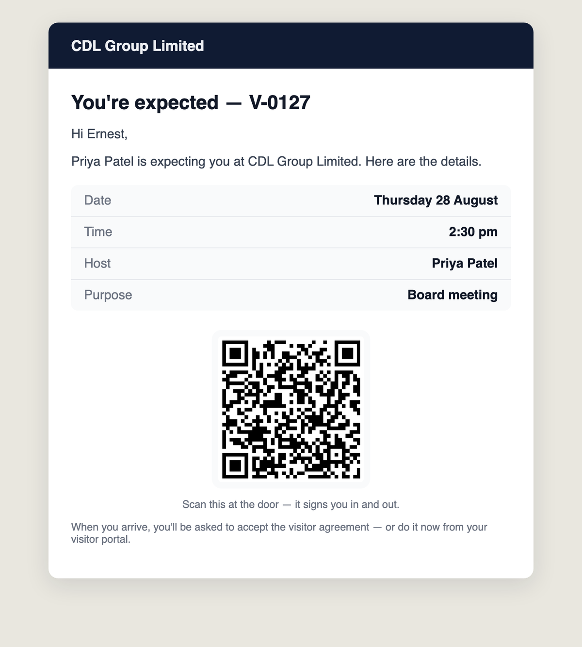 The Janus confirmation email: visit details with date, time, host and purpose, and a QR code that signs the visitor in and out at the door.
